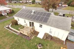 a home with solar panels on the roof